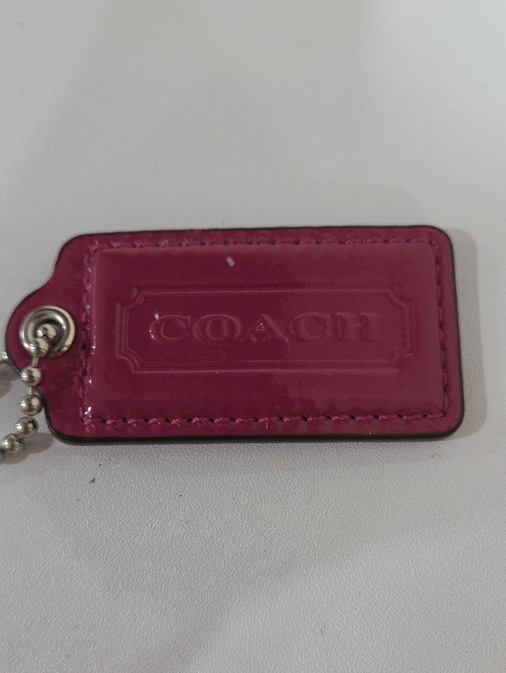 COACH Hot Pink Patent Leather Hang Tag with Ball Chain